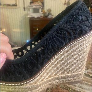 black Tori burch peep toe wedges with bow one top. They have only been worn once